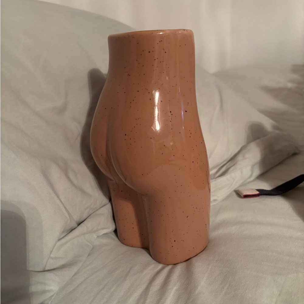 Urban Outfitters tan female body vase
